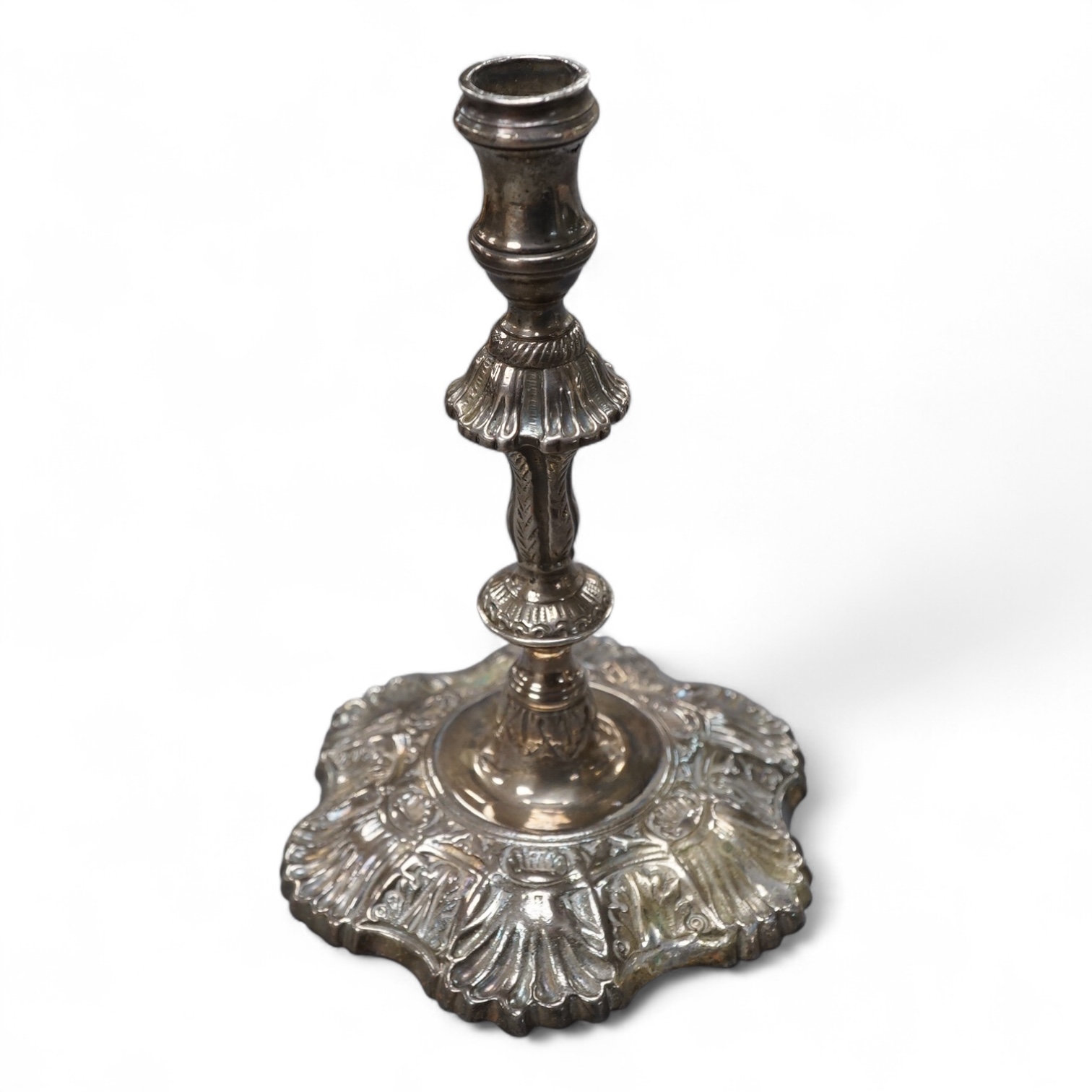 A George II cast silver taperstick, makers mark rubbed, London, 1750, 12cm.